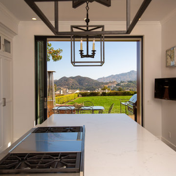 Large Sliding Glass Doors Create an Open-Air Kitchen