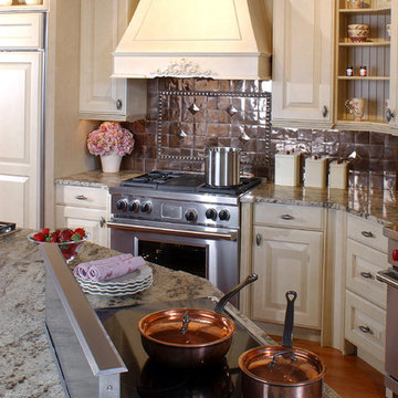 Latte cabinets with a copper backsplash