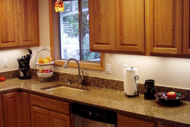 Inspiration for a mid-sized l-shaped kitchen remodel in Portland with quartzite countertops