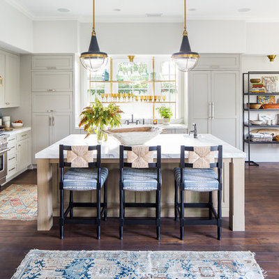 Inspiration for a country l-shaped dark wood floor and brown floor eat-in kitchen remodel in Los Angeles with recessed-panel cabinets, white cabinets, blue backsplash, mosaic tile backsplash, stainless steel appliances, an island and white countertops