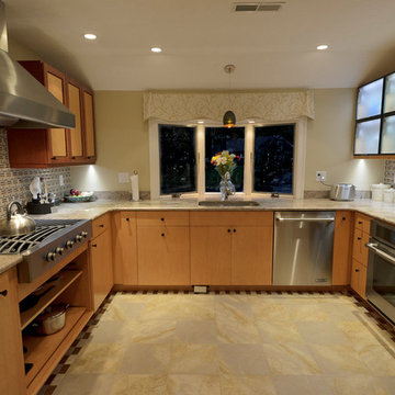 LED lighting in 3 locations illuminate the space; wall cabinets, under cabinets