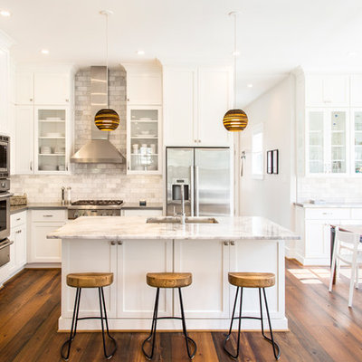 Example of a transitional u-shaped dark wood floor open concept kitchen design in Richmond with an undermount sink, shaker cabinets, white cabinets, gray backsplash, stainless steel appliances and an island