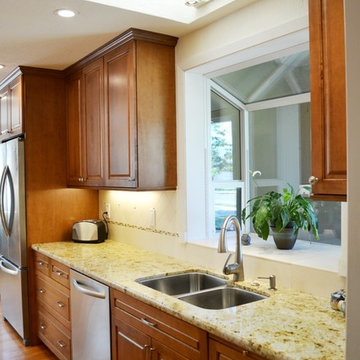 Light and Cozy Galley Kitchen Designed By Cynthia Collins