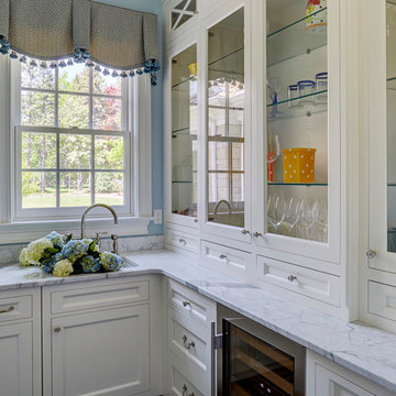 Light Filled Butler's Pantry with Painted White Cabinetry