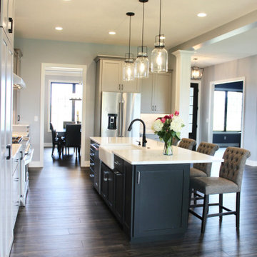 Light Gray and Black Painted Kitchen Home by Kerkhoff Homes in Bettendorf Quad C
