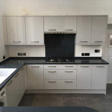 Light Grey Gloss kitchen with Charcoal Soapstone worktops