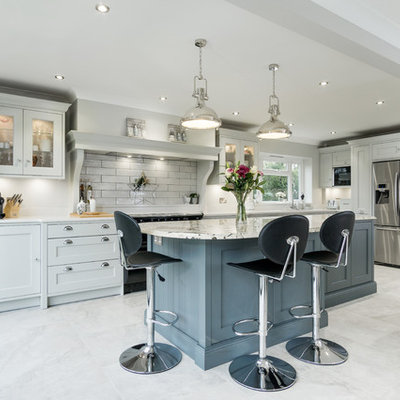 Large transitional single-wall eat-in kitchen photo in Other with shaker cabinets, an island, gray cabinets and quartz countertops