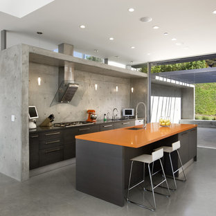 Inspiration for a modern kitchen in Los Angeles with an undermount sink, flat-panel cabinets, brown cabinets and orange benchtop.