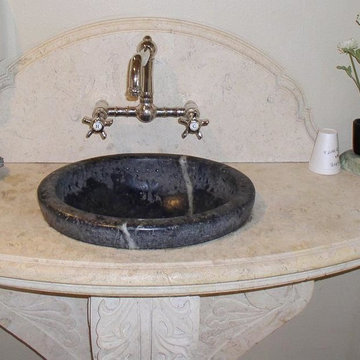 Limestone vanity with soapstone sink