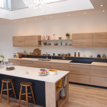 Limewashed oak and painted open plan kitchen