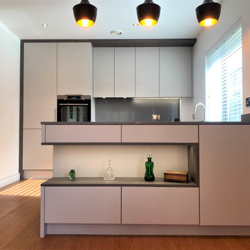 linear lines modern city apartment peninsular layout kitchen