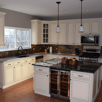 Linen Cabinets with Light Quartz Countertop and Dark Quartz Countertop