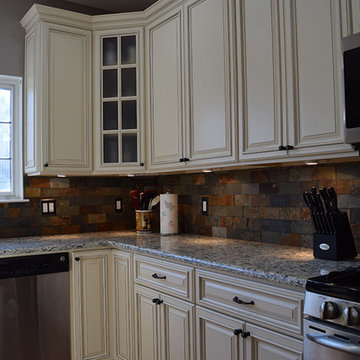 Linen Cabinets with Light Quartz Countertop and Dark Quartz Countertop