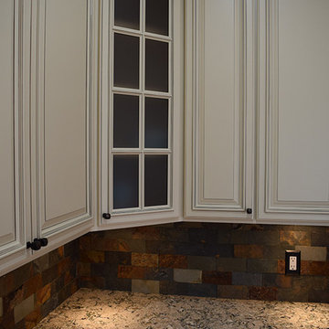 Linen Cabinets with Light Quartz Countertop and Dark Quartz Countertop