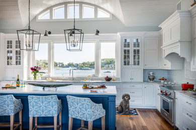 Kitchen - coastal l-shaped dark wood floor, brown floor and shiplap ceiling kitchen idea in Boston with an undermount sink, shaker cabinets, white cabinets, gray backsplash, stainless steel appliances, an island and gray countertops