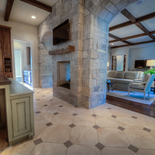 Photo of a large traditional single-wall eat-in kitchen in Houston with a farmhouse sink, raised-panel cabinets, brown cabinets, concrete benchtops, white splashback, mosaic tile splashback, stainless steel appliances, marble floors, with island, white floor and grey benchtop.