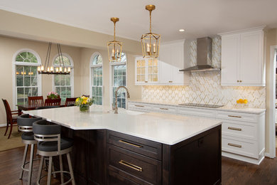 Inspiration for a large transitional medium tone wood floor and brown floor eat-in kitchen remodel in DC Metro with an undermount sink, recessed-panel cabinets, white cabinets, quartzite countertops, white backsplash, marble backsplash, stainless steel appliances, an island and white countertops