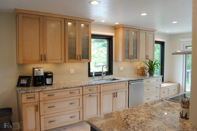 Mid-sized asian single-wall light wood floor eat-in kitchen photo in Cleveland with a single-bowl sink, shaker cabinets, light wood cabinets, granite countertops, white backsplash, subway tile backsplash, stainless steel appliances and an island