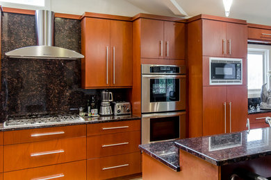 Eat-in kitchen - huge contemporary l-shaped eat-in kitchen idea in New York with a double-bowl sink, flat-panel cabinets, brown cabinets, granite countertops, brown backsplash, stainless steel appliances and an island