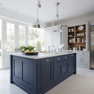 Inspiration for a large timeless marble floor enclosed kitchen remodel in Manchester with shaker cabinets, stainless steel appliances, an island and blue cabinets