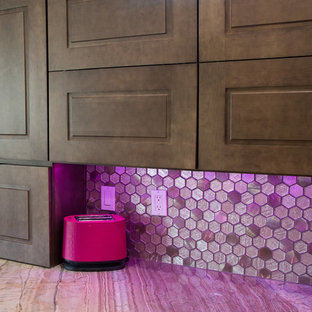 Photo of an expansive traditional l-shaped open plan kitchen in Phoenix with an undermount sink, medium wood cabinets, quartzite benchtops, multi-coloured splashback, glass tile splashback, stainless steel appliances, ceramic floors, a peninsula, brown floor and multi-coloured benchtop.