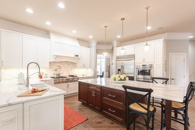 Inspiration for a modern kitchen remodel in DC Metro with quartz countertops and an island