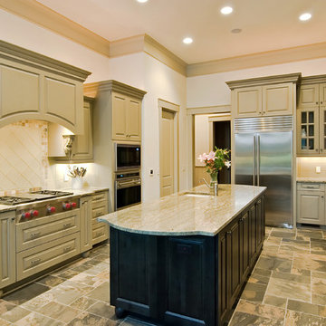 Luxury kitchen with new cabinets and slate floor