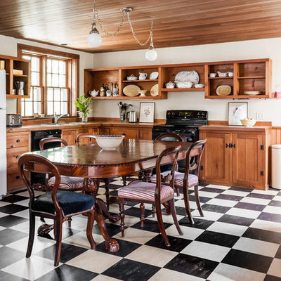 Inspiration for a timeless l-shaped linoleum floor eat-in kitchen remodel in Montreal with recessed-panel cabinets, light wood cabinets, laminate countertops, white backsplash, wood backsplash, no island and beige countertops