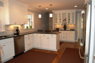 Kitchen pantry - large kitchen pantry idea in Richmond with recessed-panel cabinets and white cabinets