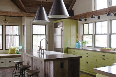 Large trendy l-shaped dark wood floor eat-in kitchen photo in Boston with stainless steel appliances, green cabinets, a single-bowl sink, recessed-panel cabinets, solid surface countertops and an island