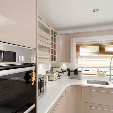 Make a spacious modern kitchen feel warm and inviting with pale coffee colours