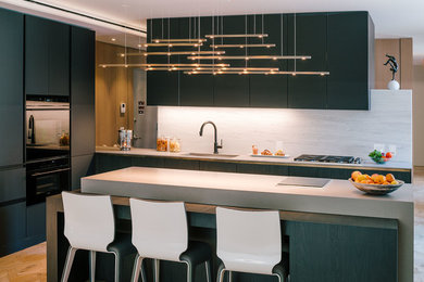 Large minimalist l-shaped light wood floor and beige floor open concept kitchen photo in New York with an undermount sink, flat-panel cabinets, black cabinets, concrete countertops, gray backsplash, stone slab backsplash, black appliances and an island