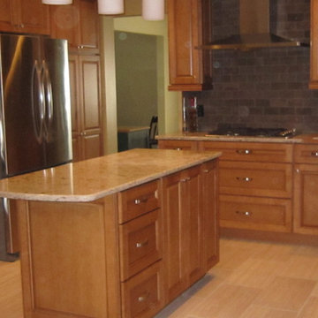 maple cabinetry w/Cambria Quartz countertop