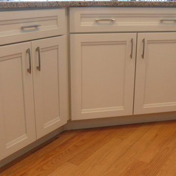 Maple cabinets finished in Ballet White