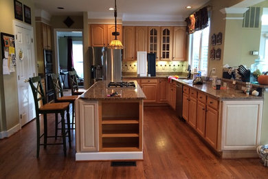 Large elegant kitchen photo in Baltimore with an island