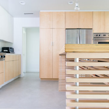 maple details at kitchen island + cabinetry