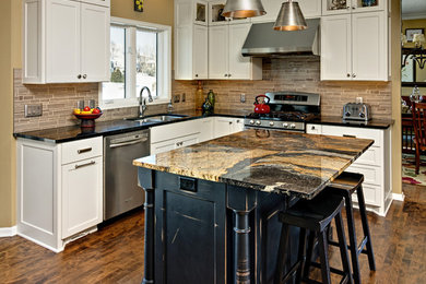 Transitional l-shaped medium tone wood floor eat-in kitchen photo in Minneapolis with quartz countertops, a double-bowl sink, shaker cabinets, white cabinets, gray backsplash, stainless steel appliances and an island