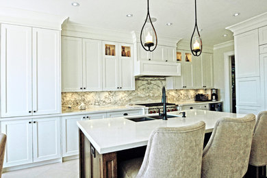 Example of a large transitional u-shaped limestone floor eat-in kitchen design in Toronto with a double-bowl sink, shaker cabinets, white cabinets, gray backsplash, stainless steel appliances, an island and stone slab backsplash