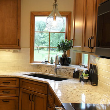 Maple Kitchen With Black and Gold Accents