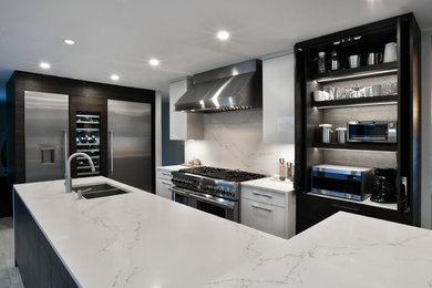 Design ideas for a large contemporary galley kitchen/diner in Other with a double-bowl sink, flat-panel cabinets, dark wood cabinets, engineered stone countertops, white splashback, stainless steel appliances, ceramic flooring, an island, grey floors and white worktops.