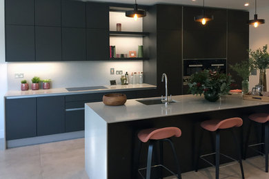 Design ideas for a contemporary kitchen in Dublin with grey cabinets, ceramic flooring, an island and grey worktops.
