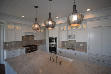 This is an example of a beach style kitchen in New York.