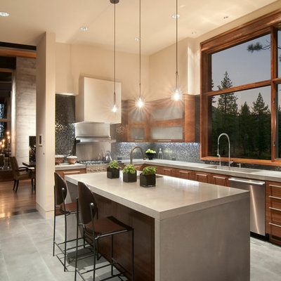 Example of a trendy kitchen design in Sacramento with flat-panel cabinets, dark wood cabinets, black backsplash, mosaic tile backsplash, stainless steel appliances, concrete countertops and an integrated sink