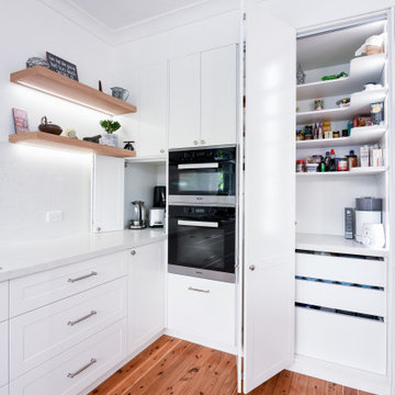 Pantry appliance cabinet with bi-fold doors