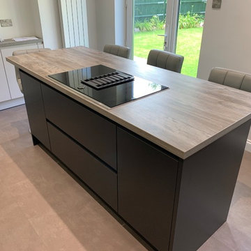 Matt Cashmere & Anthracite handleless kitchen in a typical 4 bed property
