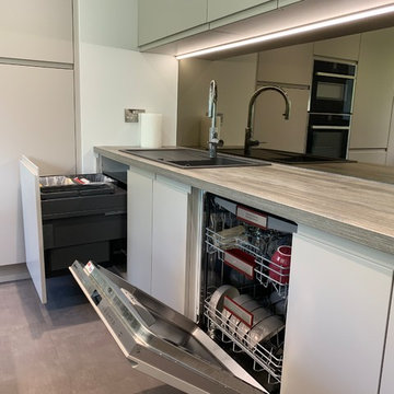 Matt Cashmere & Anthracite handleless kitchen in a typical 4 bed property