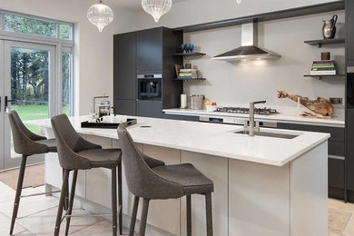 This is an example of a contemporary kitchen in Other with an integrated sink, flat-panel cabinets, composite countertops, stainless steel appliances, an island and yellow worktops.