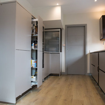 Matt taupe kitchen with pull out storage