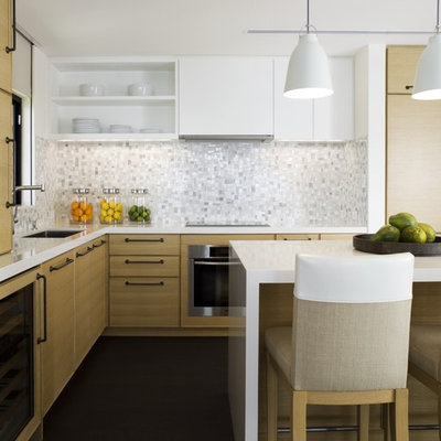 Inspiration for a contemporary kitchen remodel in Hawaii with white backsplash, flat-panel cabinets and light wood cabinets