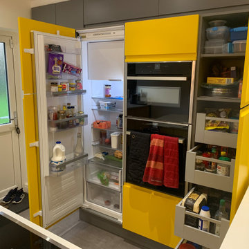 Maximise your storage with a full height fridge and easily accessed larder unit